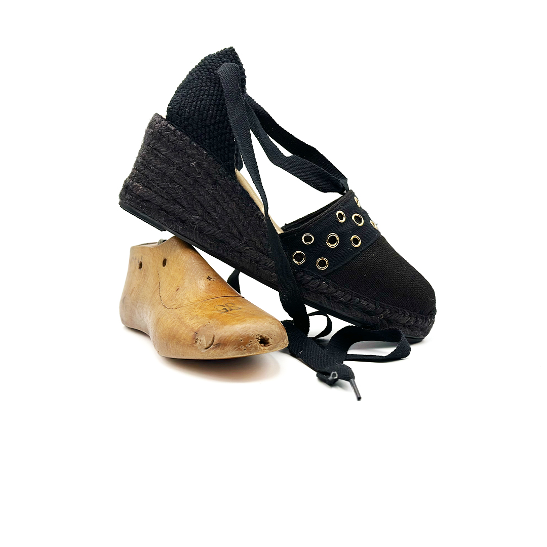 Valencia Negro Hoyuelos Oro